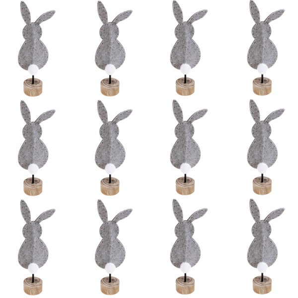 Dekorative Osterhasenfiguren aus Filz mit Holzsockel