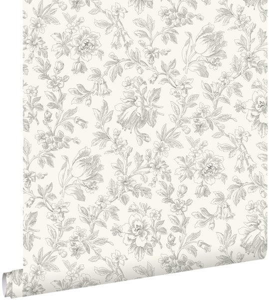 Vliestapete mit floralem Vintage-Muster aus grauen Blumen und Blättern auf hellem Untergrund.