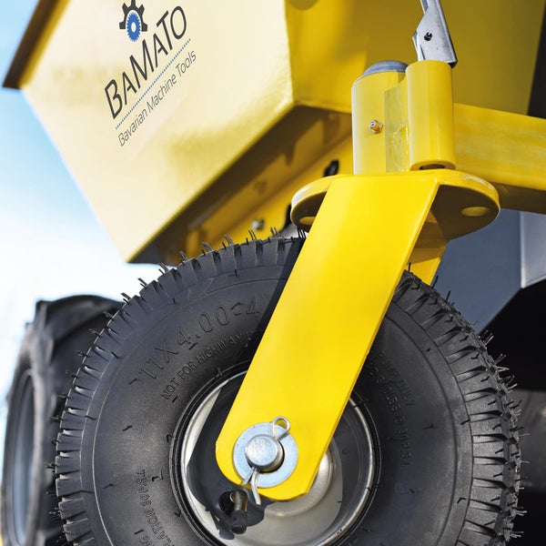 Detailansicht eines gelben Bamato-Geräts mit Reifen.