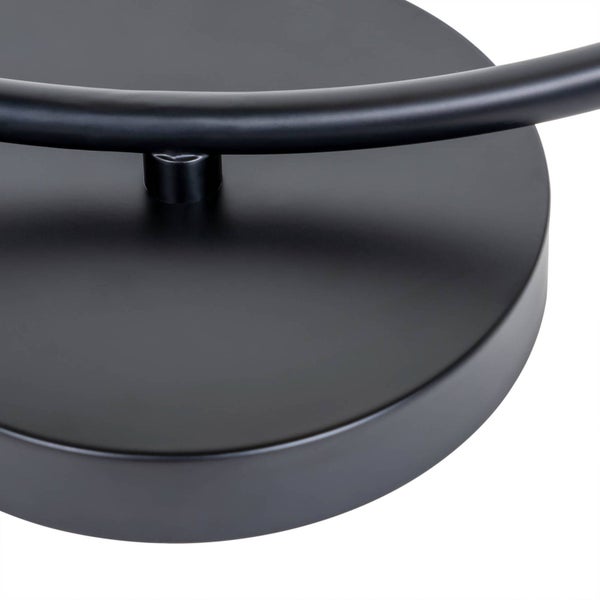 Detailaufnahme einer Wandleuchte mit runder Montageplatte