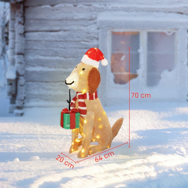 LED Weihnachtsfigur Hund mit Weihnachtsmütze, Schal und Geschenk, 70 Zentimeter hoch, 64 Zentimeter breit und 20 Zentimeter tief.