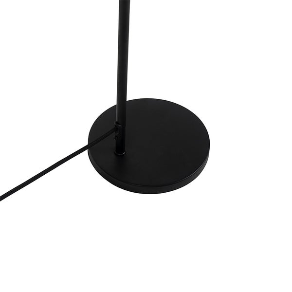 Runder Lampenfuß aus schwarzem Metall mit Kabel für eine Stehleuchte.