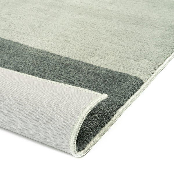 Teppich mit Streifenmuster und gewendetem Eckdetail