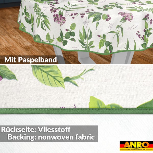 Rundes Tischtuch mit Blumenmuster, Paspelband und Vliesstoff-Rückseite. ANRO Logo.