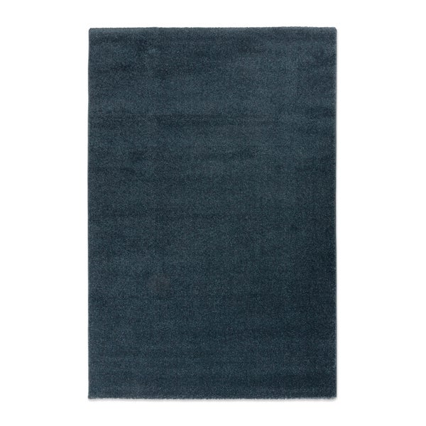 Rechteckiger Hochflor-Teppich in Dunkelblau.