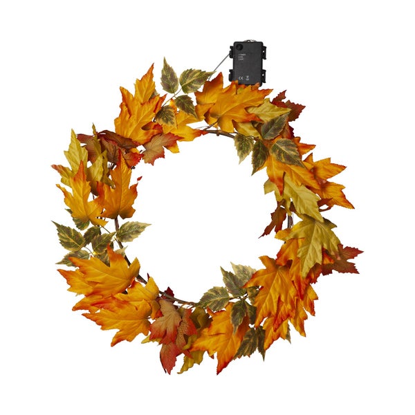 Dekorativer Herbstlaubkranz mit Beleuchtung