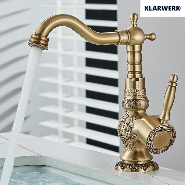 Einhebel Waschbeckenarmatur aus Metall in Antikoptik mit floralen Verzierungen und fließendem Wasser Klarwerk Logo
