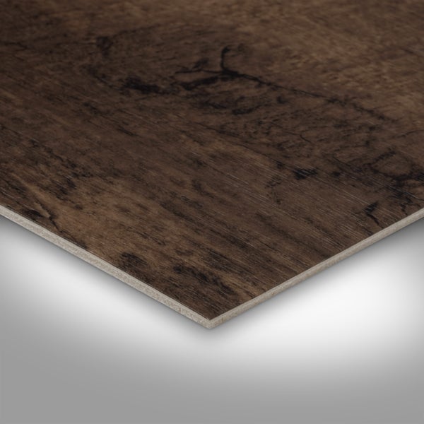 Wohnzimmer mit Ecksofa, Stehlampe und Holzboden