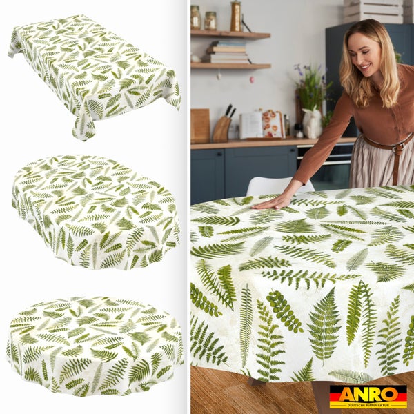 Tischdecke mit Farn-Muster in rechteckig, oval und rund. Eine Frau streicht über die Tischdecke in einer Küche. ANRO Logo.