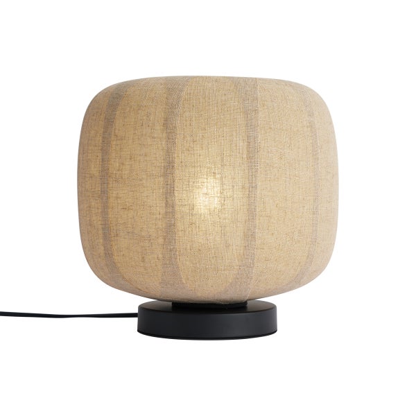 Tischleuchte mit rundem, beigem Textilschirm und schwarzem Standfuß.