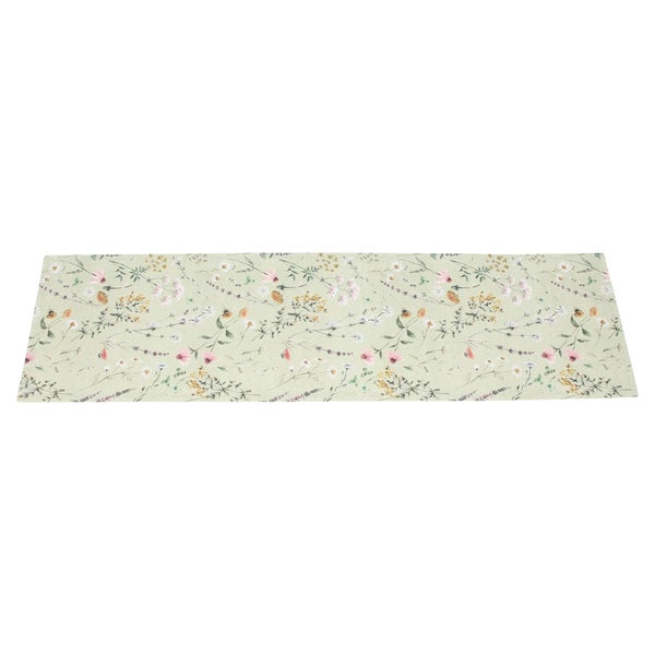 Tischläufer mit floralem Muster aus verschiedenen Wildblumen und Zweigen.