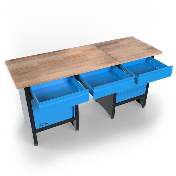 Güde Werkbank mit massiver Holzplatte, zwei Unterschränken mit drei geöffneten blauen Schubladen auf schwarzem Stahlgestell und Güde Logo.