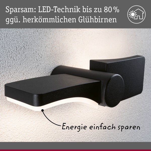 Moderne schwarze LED-Wandleuchte. Der Text weist auf eine Energieersparnis von bis zu 80 Prozent gegenüber herkömmlichen Glühbirnen hin.