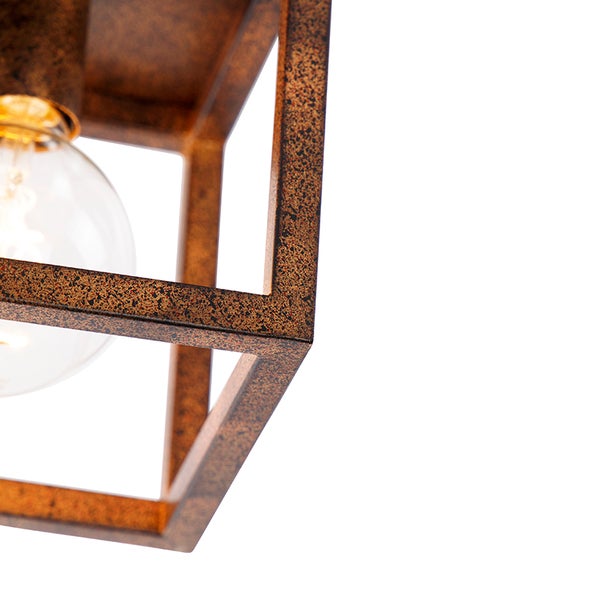 Detailansicht einer Deckenleuchte mit quadratischem, antikfarbenem Metallrahmen und sichtbarer Glühbirne