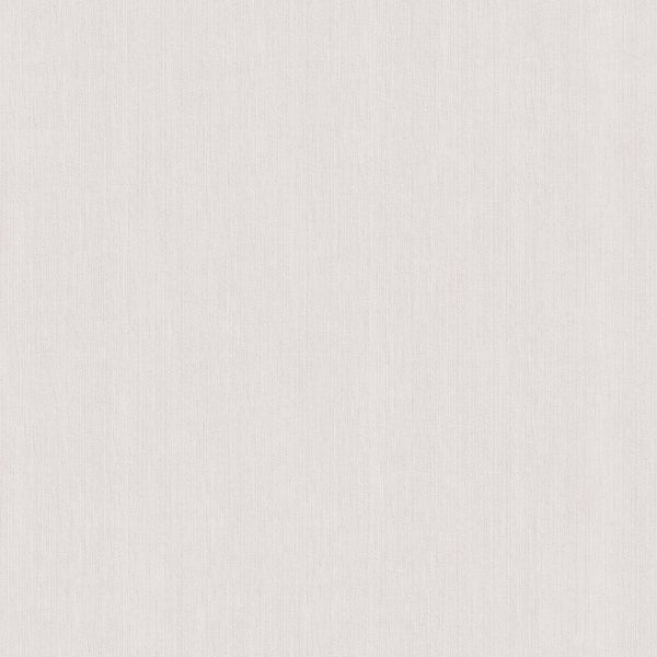 Dekorative Kissen in verschiedenen Formen und Designs auf einem Sofa.