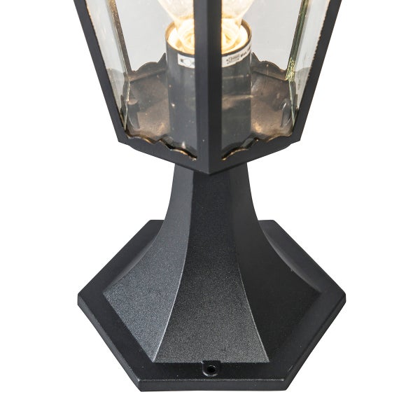 Schwarze Sockelleuchte aus Aluminium mit sechsseitigem Gehäuse aus Glas für den Außenbereich.