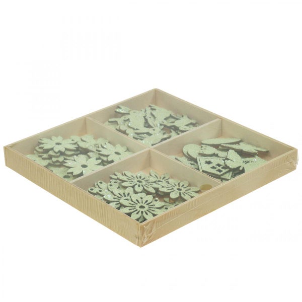 Dekorative Holzstreuteile in einer Sortierbox mit Blumen, Blättern, Schmetterlingen und Häusern.