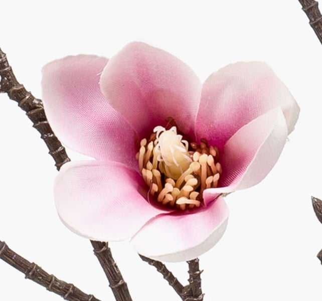 Künstliche Magnolie mit rosa-weißer Blüte und Knospe an einem braunen Zweig.