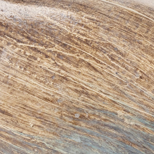 Nahaufnahme einer beigen Oberfläche mit Streifenmuster