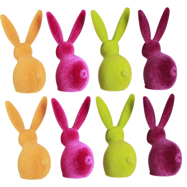 Acht beflockte Osterhasen Figuren aus Kunststoff als Dekoration für das Osterfest.