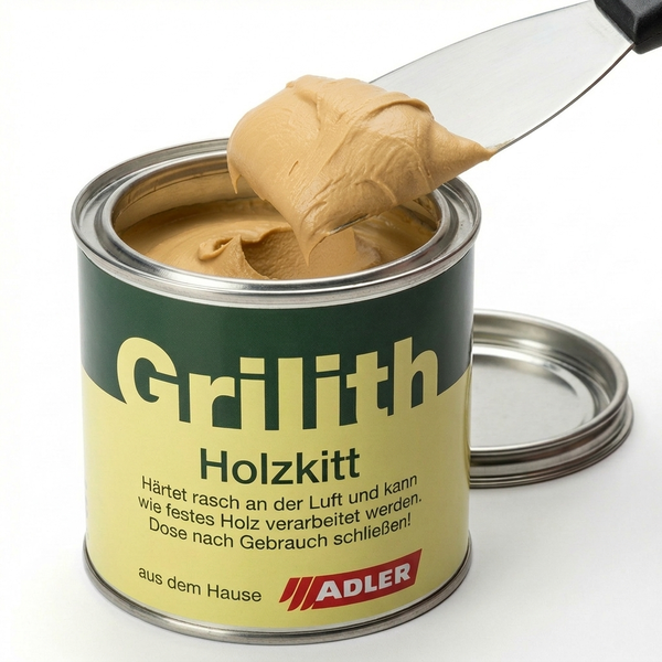 Grilith Holzkitt von Adler in der Dose mit einem Metallspachtel und einer Portion Holzmasse.