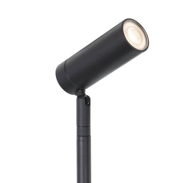 Schwarzer LED-Gartenstrahler in zylindrischer Form auf einem Standrohr.