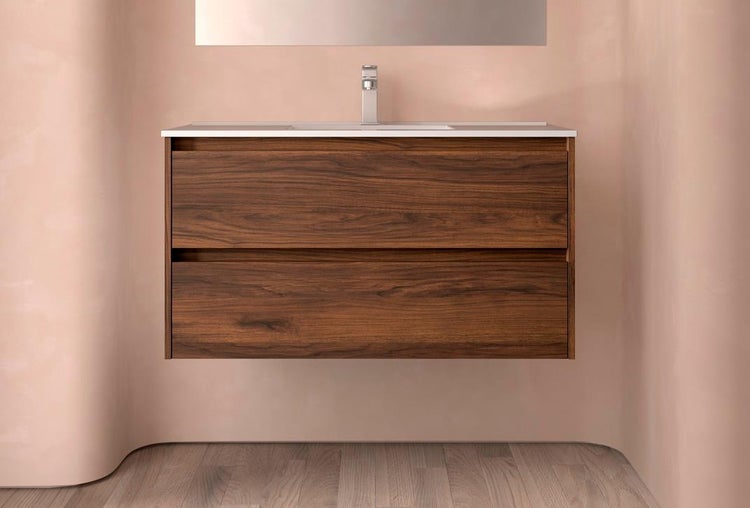 Wandhängender Waschtischunterschrank in Holzoptik mit zwei Schubladen, weißem Waschbecken und verchromter Armatur.