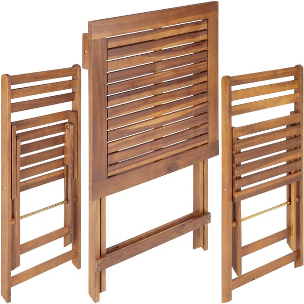 Balkonset aus Holz bestehend aus einem Klapptisch und zwei Klappstühlen, platzsparend zusammengeklappt.