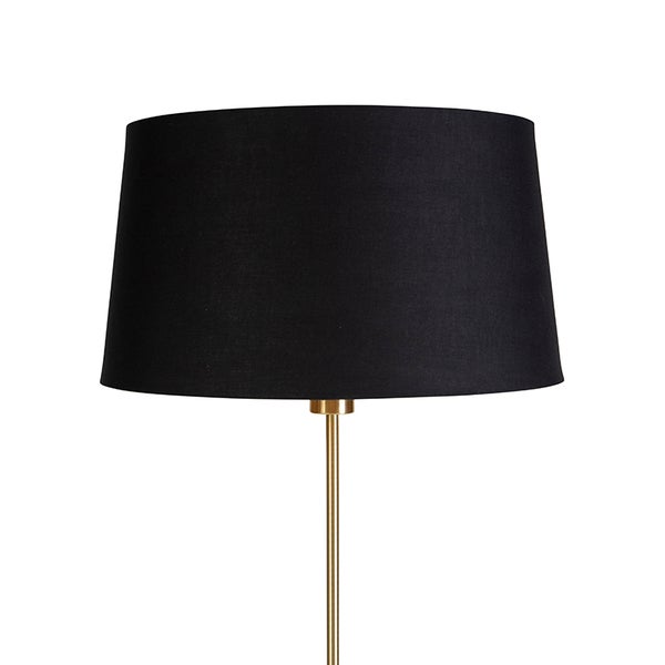 Schwarzer Textil-Lampenschirm auf einem goldfarbenen Metallstab.