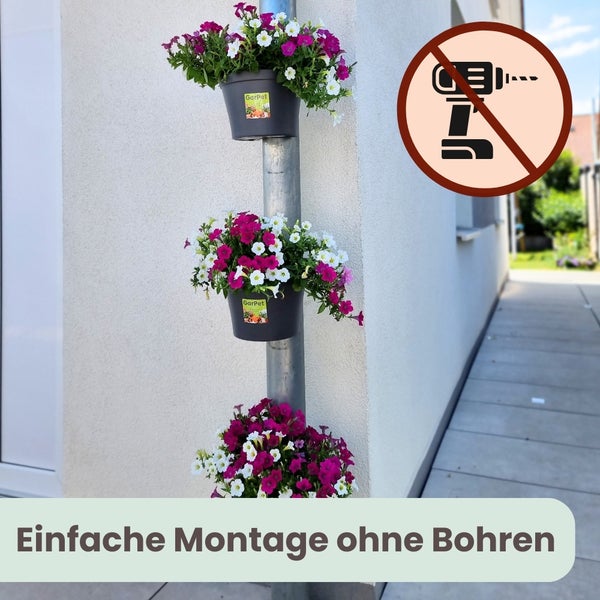 GarPet dekorativer Pflanztopf für Fallrohre und Pfosten, bepflanzt mit gelben und violetten Blumen.