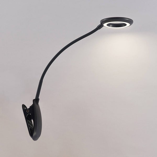Schwarze LED-Klemmleuchte mit flexiblem Arm und ringförmigem Leuchtkopf.