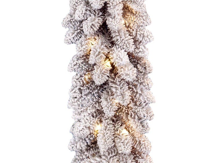 Künstliche, verschneite Weihnachtsgirlande mit integrierter LED Beleuchtung für eine festliche Dekoration.