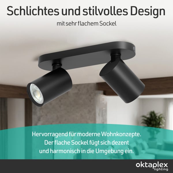 Schwarzer Deckenstrahler mit zwei verstellbaren zylindrischen Spots und flachem Sockel. oktaplex lighting Logo.