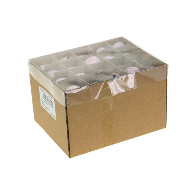 Verpackung mit kleinen Deko-Eiern