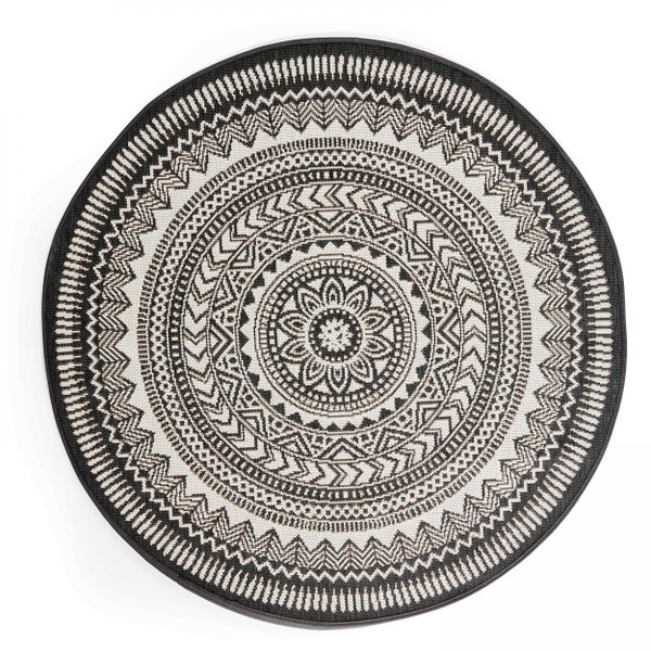 Runder Teppich in Schwarz und Weiß mit geometrischem Muster im Boho-Stil für den Innenbereich und Außenbereich.