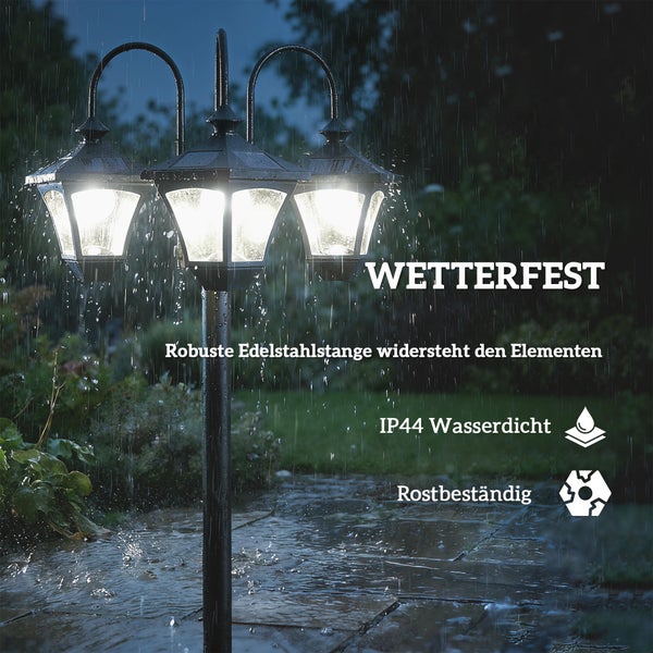 Dreiflammige Gartenlaterne aus Edelstahl im Regen, wetterfest, IP44 wasserdicht und rostbeständig.