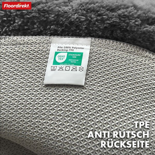 Rückseite eines Teppichs mit TPE Antirutschbeschichtung und OEKO-TEX Siegel