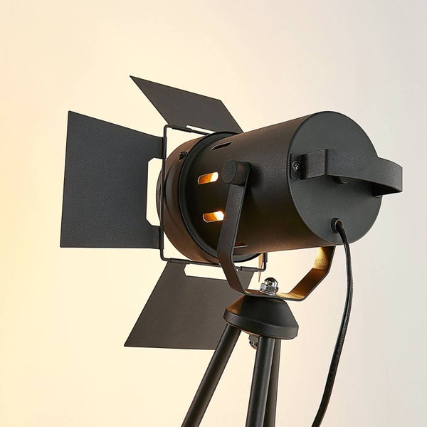 Schwarze Stehlampe im Scheinwerferdesign mit Stativ
