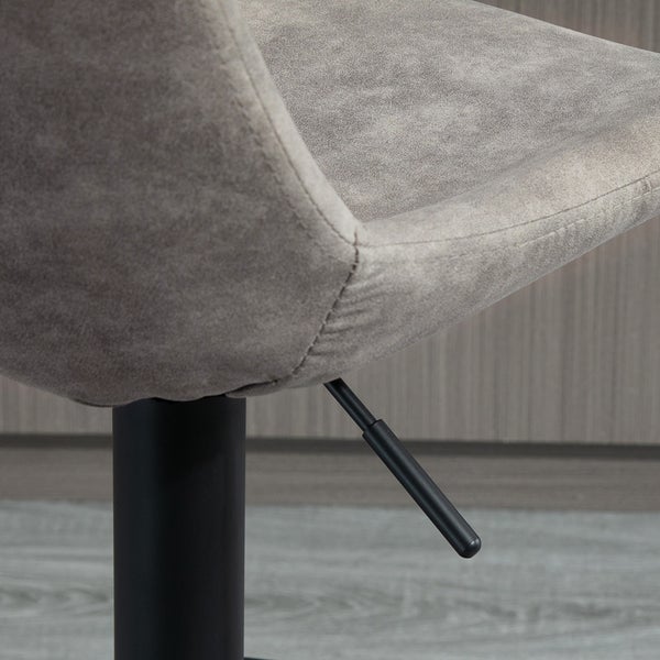 Detailaufnahme eines Barhockers mit Bezug und schwarzem Metallfuß