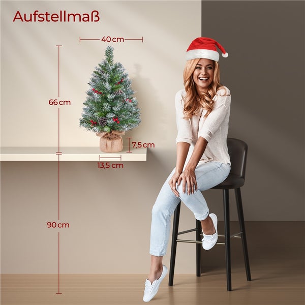 Dekorativer, schneebedeckter Weihnachtsbaum mit Messangaben