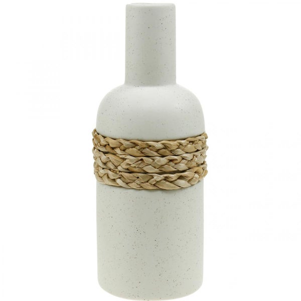 Gesprenkelte Keramikvase mit geflochtenem Strohband.