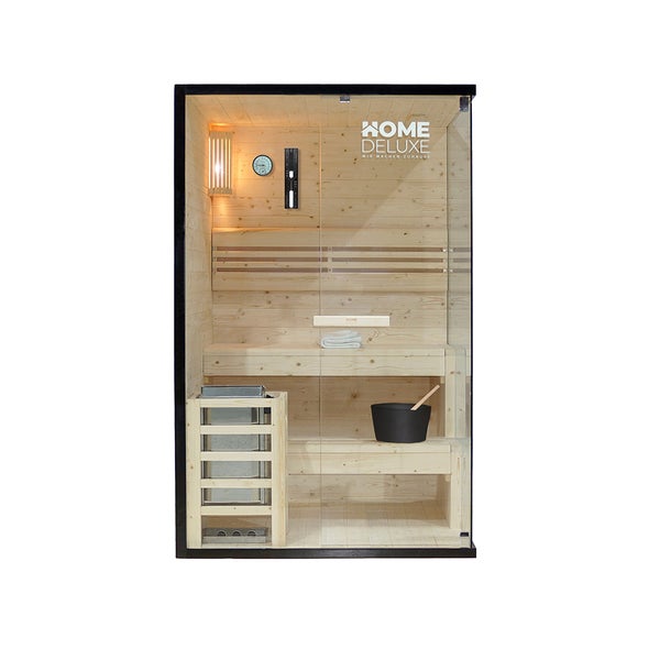 Home Deluxe Sauna aus hellem Holz mit Glasfront, integriertem Ofen, Thermometer und Sauna-Zubehör.