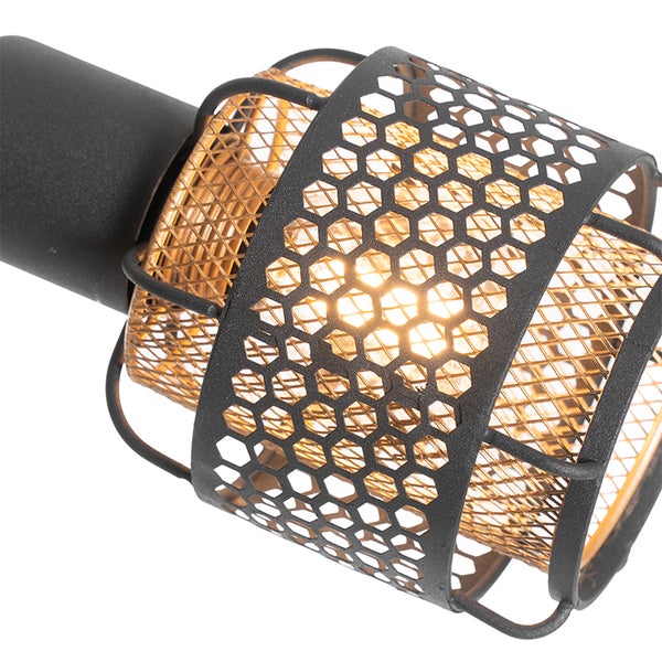 Detailaufnahme einer Lampe mit Metallgitter