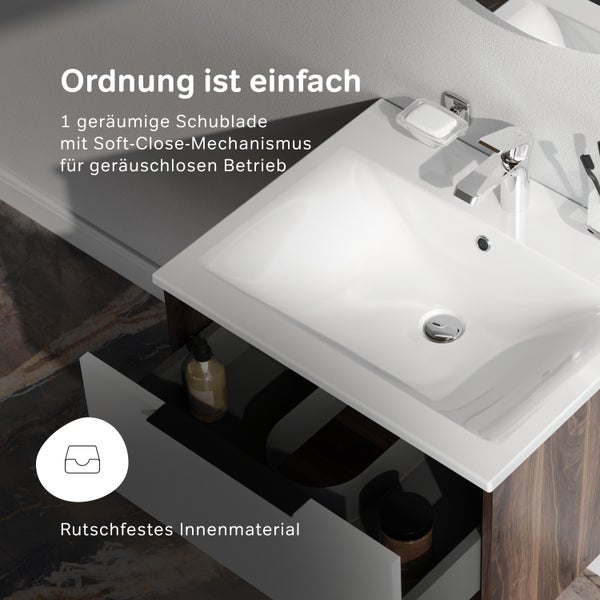 Waschtischunterschrank mit einer Schublade mit Soft-Close-Mechanismus und rutschfestem Innenmaterial sowie integriertem Waschbecken.