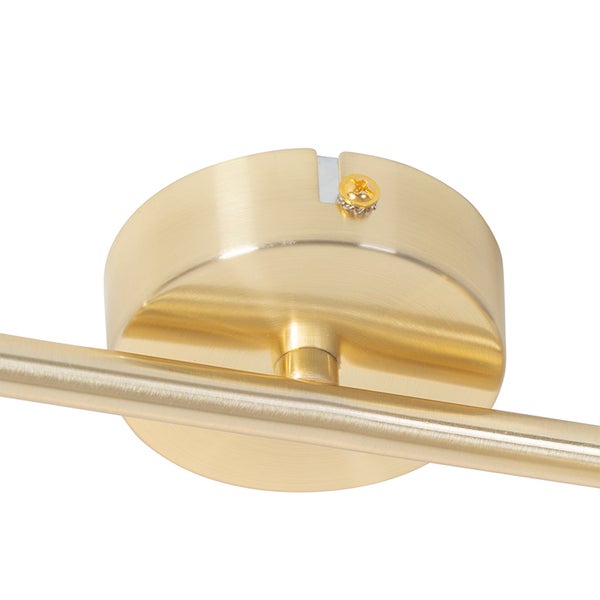 Detailaufnahme einer Deckenleuchte mit goldenem Finish