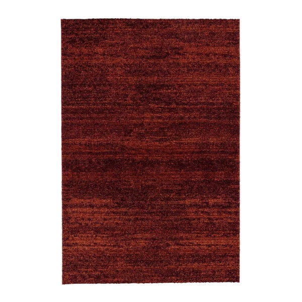 Rechteckiger, melierter Teppich in Rostrot und Braun.