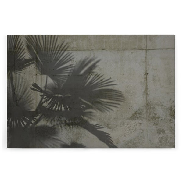 Leinwandbild mit Schattenwurf von Palmblättern auf einer Betonwand.