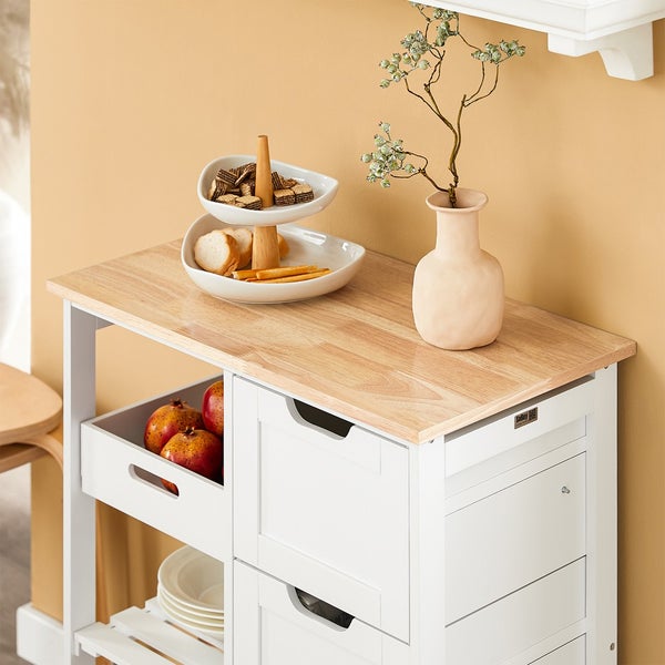 Küchenwagen mit Schubladen, Ablagen und Holzarbeitsplatte, dekoriert mit Schale und Vase.