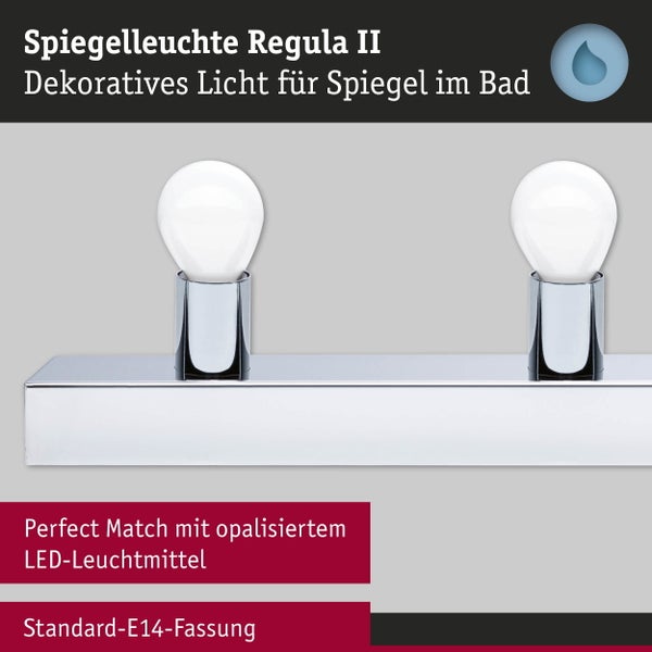 Spiegelleuchte Regula II aus Chrom mit zwei E14-Fassungen, geeignet für das Badezimmer und mit opalisierten LED-Leuchtmitteln.