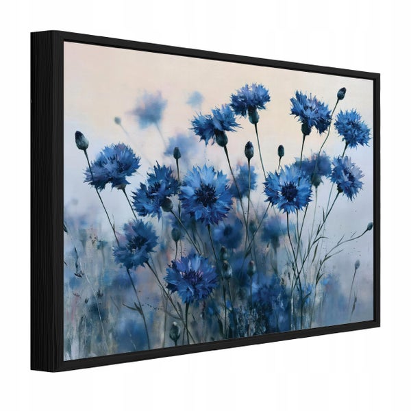 Wandbild mit einer Darstellung von Kornblumen in einem schwarzen Rahmen.